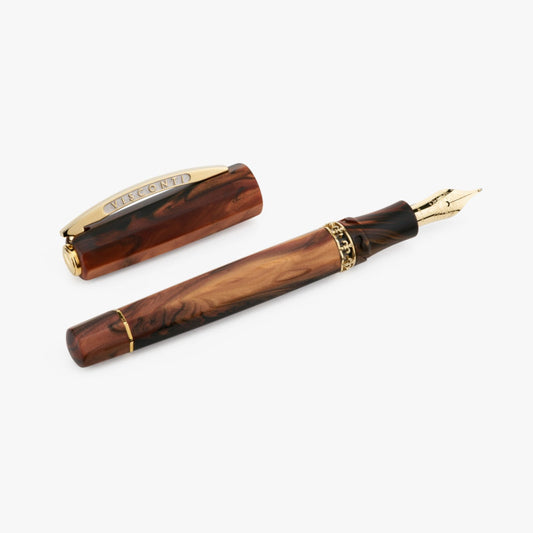 Stylo plume Medici en or jaune de Visconti avec son capuchon à côté
